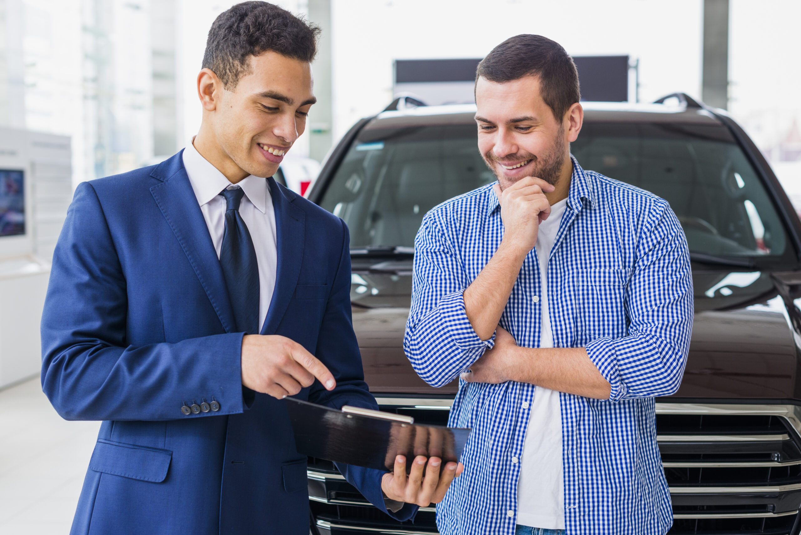 car-dealer-talking-client